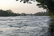 Kaveri river to rail bridge, view downstream from Atmaveda, Srirangapatna, Karnataka, India